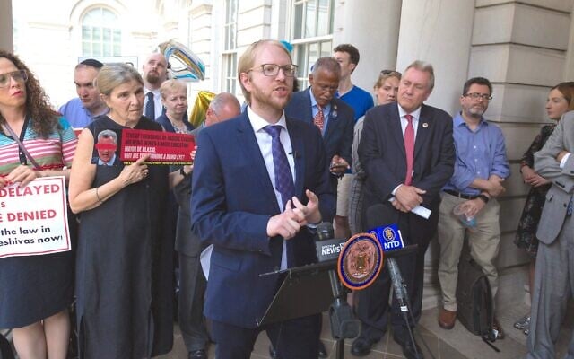 Naftuli Moster, then-executive director of the nonprofit advocacy group Yaffed, speaks at a news conference, July 24, 2019. (Yaffed via JTA)