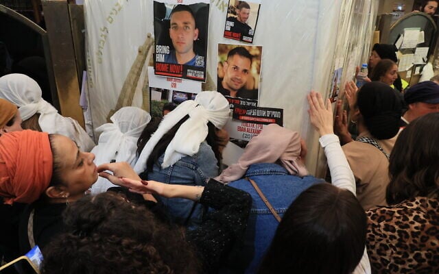 Hostage families and mothers praying at Rachel’s Tomb in Bethlehem in the West Bank in November 2024. (David Weill)