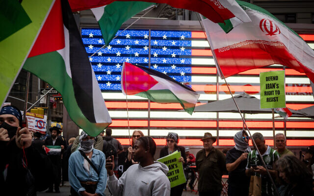 Anti-Israel protesters wave flags in Times Square, New York City, June 16, 2025. (Luke Tress/Times of Israel) Anti-Israel protesters wave flags in Times Square, New York City, June 16, 2025. (Luke Tress/Times of Israel)