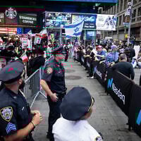 Police separate pro- and anti-Israel protesters in New York City, June 16, 2025. (Luke Tress/Times of Israel)
