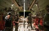 Israeli Air Force staff prepare boxes of humanitarian aid ahead of an airdrop in the Gaza Strip, July 26, 2025. (IDF)