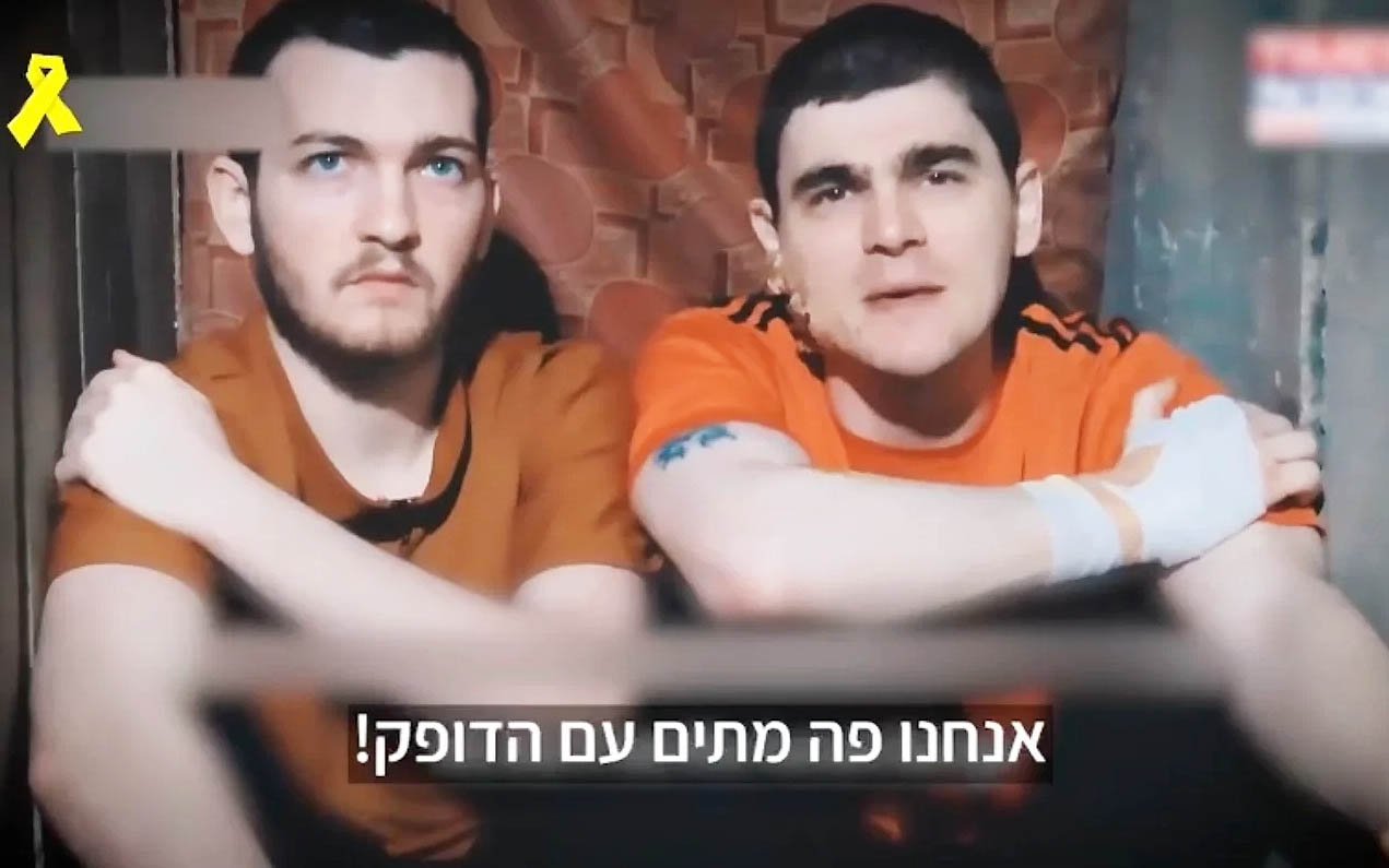 Pleading for deal, families okay clips showing hostages Maxim Herkin, Bar Kuperstein