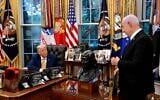 US President Donald Trump, left, meets Prime Minister Benjamin Netanyahu in the White House, July 8, 2025. (Avi Ohayon/GPO)