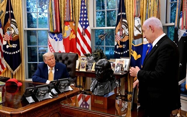 US President Donald Trump, left, meets Prime Minister Benjamin Netanyahu in the White House, July 8, 2025. (Avi Ohayon/GPO)