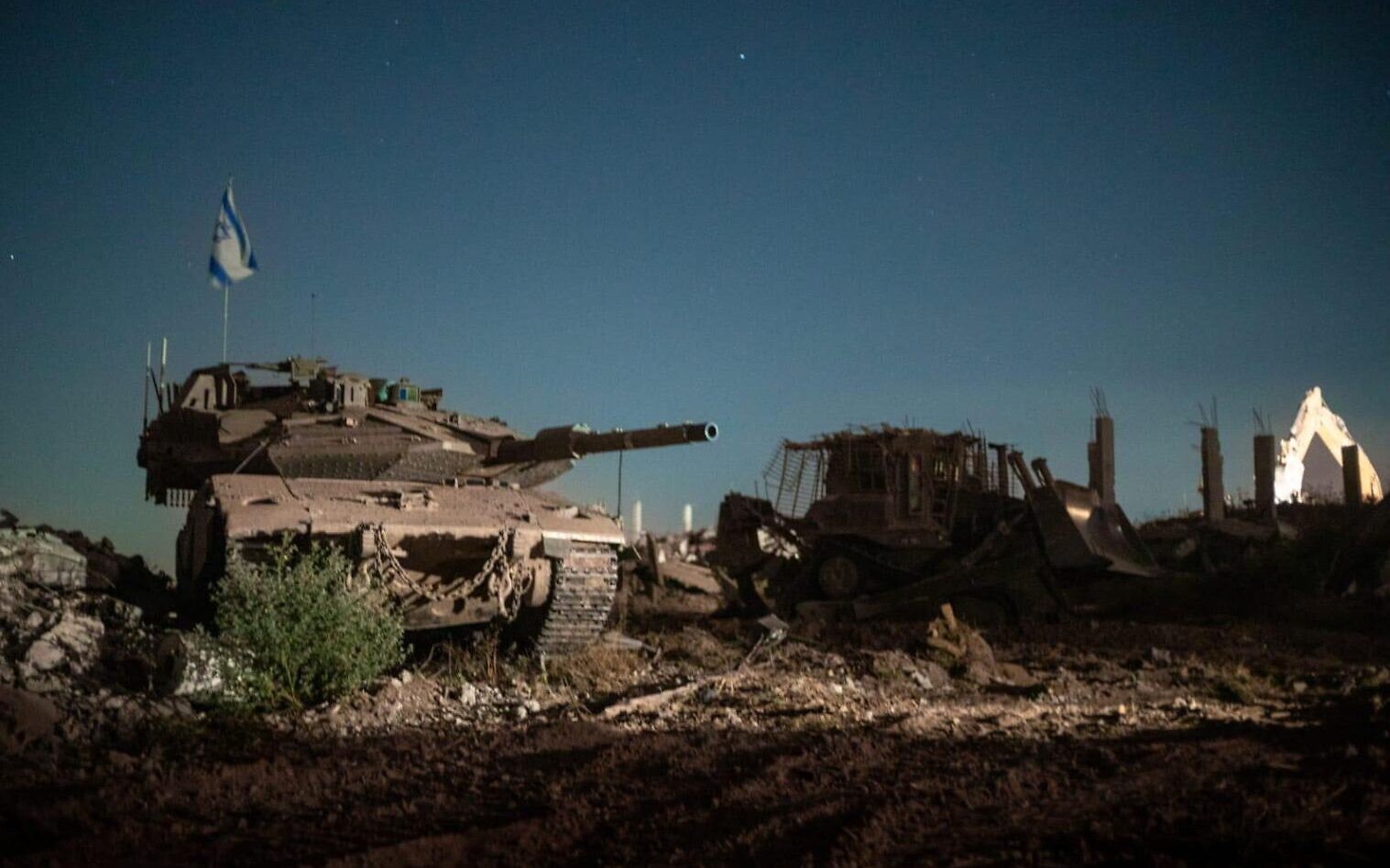 NextImg:Gazan officials say at least 25 killed, most by gunfire while waiting for aid