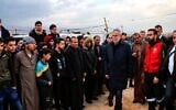 Austrian President Alexander Van der Bellen (4th-R) visits a Syrian refugee camp near the village of Hawsh Al-Nabi, in Lebanon's eastern Bekaa valley, on December 10, 2018. (AFP)