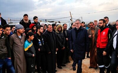 Austrian President Alexander Van der Bellen (4th-R) visits a Syrian refugee camp near the village of Hawsh Al-Nabi, in Lebanon's eastern Bekaa valley, on December 10, 2018. (AFP)