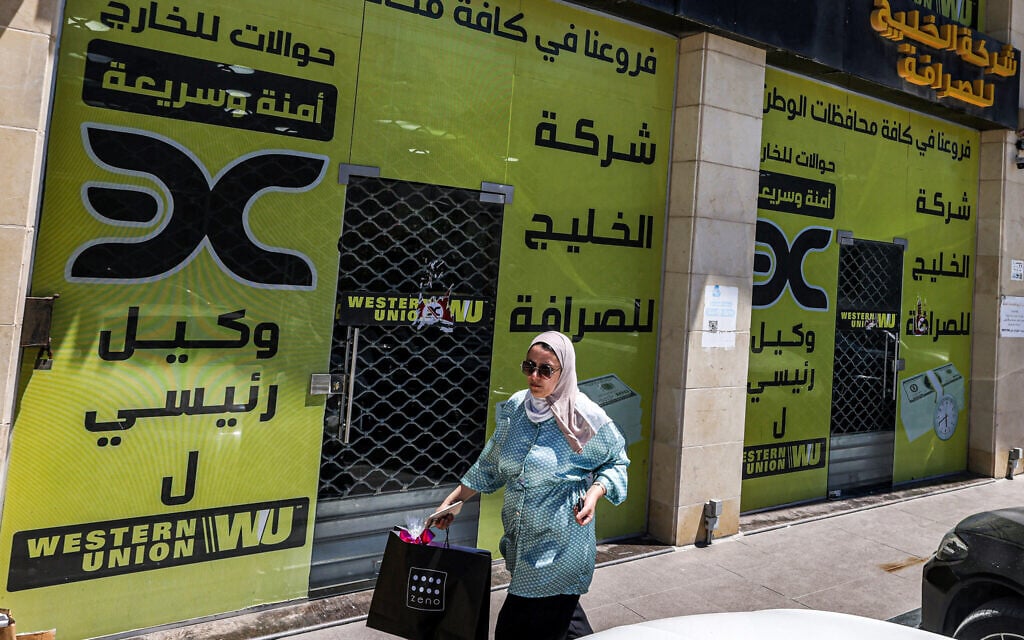 The West Bank economy runs on shekels. So why aren’t Palestinian banks accepting them?