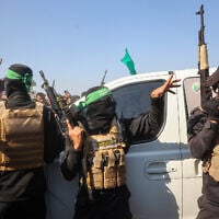 Illustrative: Palestinian terrorist groups Islamic Jihad and Hamas arrive near the family home of slain Hamas leader Yahya Sinwar before handing over Israeli hostages and a Thai hostage to a Red Cross team in Khan Yunis on January 30, 2025. (Eyad BABA / AFP)
