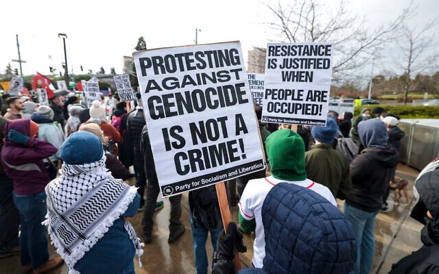 Pro-Palestinian, anti-Israel demonstrators protest the arrest of former Columbia University student activist Mahmoud Khalil in Seattle, Washington, March 15, 2025. (Jason Redmond / AFP)