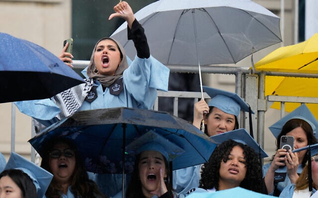 Students boo as Columbia University's president Claire Shipman speaks during the Commencement Ceremony at Columbia University in New York on May 21, 2025. (Photo by Seth Wenig / POOL / AFP)