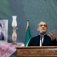 Iran's President Masoud Pezeshkian giving an address on the anniversary of the death of the country's former supreme leader Ayatollah Ruhollah Khomeini at the latter's mausoleum in Tehran on June 3, 2025. (Iranian Presidency / AFP)