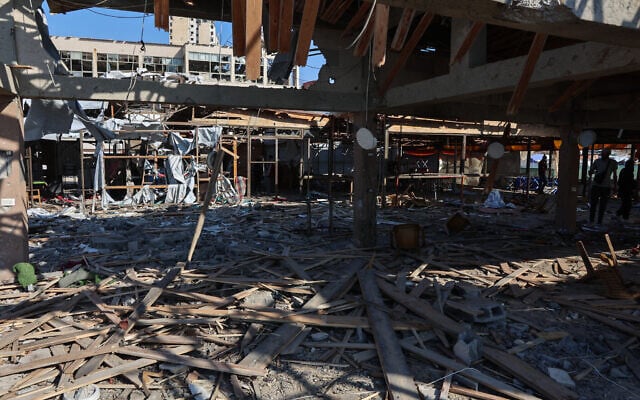 Palestinians inspect the damage at Al-Baqa cafe, which was hit by an Israeli strike on the Gaza City seafront on June 30, 2025 (Omar AL-QATTAA / AFP) Palestinians inspect the damage at Al-Baqa cafe, which was hit by an Israeli strike on the Gaza City seafront on June 30, 2025 (Omar AL-QATTAA / AFP)
