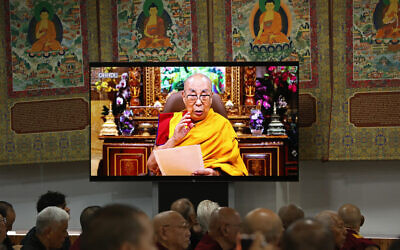 Tibetan spiritual leader the Dalai Lama speaks in a video broadcast at the start of the 15th Tibetan Religious Conference, a meeting of religious leaders in McLeod Ganj, near Dharamsala on July 2, 2025. (Sanjay BAID / AFP)