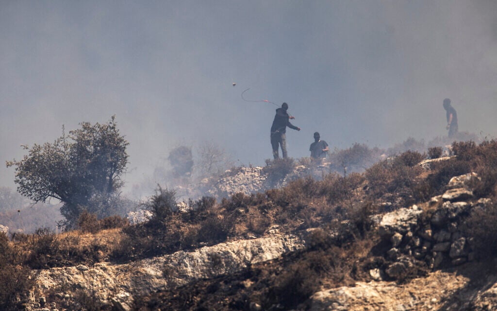 Two people said injured in settler attack on West Bank protest march