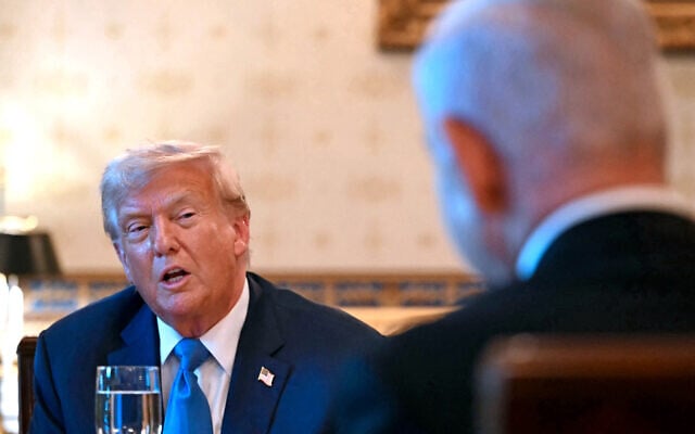 US President Donald Trump (L) meets with Prime Minister Benjamin Netanyahu (R) at the Blue Room of the White House in Washington, DC, on July 7, 2025. (ANDREW CABALLERO-REYNOLDS / AFP)