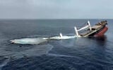 This handout picture released by Yemen's Houthi Ansarullah Media Centre on July 8, 2025 reportedly shows the Liberia-flagged bulk carrier Eternity sinking C after it was attacked by the Houthis at sea. (Photo by ANSARULLAH MEDIA CENTRE / AFP)