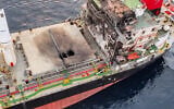 This handout picture released by Yemen's Houthi Ansarullah Media Centre on July 8, 2025, reportedly shows a view of damage to the Liberia-flagged bulk carrier Eternity C after it was attacked by the Houthis at sea. (ANSARULLAH MEDIA CENTER/ AFP)
