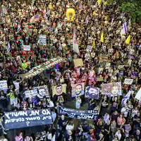 Demonstrators gather during an anti-government protest calling for action to secure the release of hostages held captive in the Gaza Strip, outside the IDF headquarters in Tel Aviv on July 12, 2025. (Jack GUEZ / AFP)