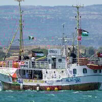This photograph shows a view of the Freedom Flotilla ship Handala as it departs for Gaza, where it aims to break the maritime blockade, at a port in Syracuse, Sicily, southern Italy, on July 13, 2025. (Giovanni Isolino/AFP)