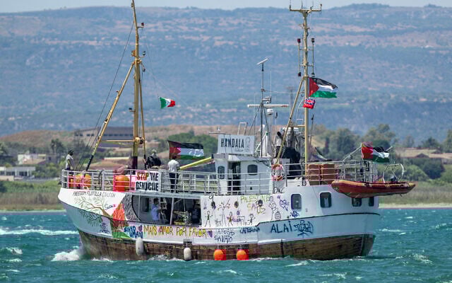This photograph shows a view of the Freedom Flotilla ship Handala as it departs for Gaza, where it aims to break the maritime blockade, at a port in Syracuse, Sicily, southern Italy, on July 13, 2025. (Giovanni Isolino/AFP)