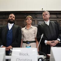 Defendant German entrepreneur and gastronome Christina Block (C) stands next to her lawyers Ingo Bott (L) and Otmar Kury ahead of the continuation of the trial against her over alleged child abduction at the District Court in Hamburg, northern Germany, on July 15, 2025. (Marcus Brandt / POOL / AFP)