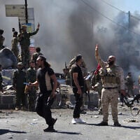 Syria's security forces enter the predominantly Druze city of Sweida on July 15, 2025, following clashes between Bedouin tribes and Druze fighters. (Sam HARIRI / AFP)