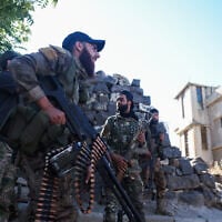 Syrian security forces deploy amid ongoing clashes in the southern Sweida city on July 16, 2025. (Photo by OMAR HAJ KADOUR / AFP)