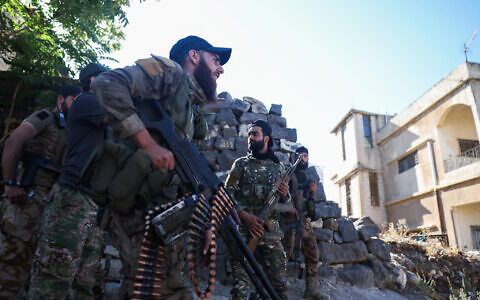Syrian security forces deploy amid ongoing clashes in the southern Sweida city on July 16, 2025. (Photo by OMAR HAJ KADOUR / AFP)