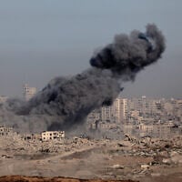 This picture taken from a position on Israel's border with the Gaza Strip shows smoke billowing during an Israeli strike on July 17, 2025. (Jack Guez/AFP)