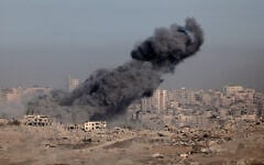 This picture taken from a position on Israel's border with the Gaza Strip shows smoke billowing during an Israeli strike on July 17, 2025. (Jack Guez/AFP)