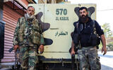 Syrian Druze fighters pose for a photograph after Syrian government forces pulled out of the southern Sweida governorate, on July 17, 2025. (Shadi AL-DUBAISI / AFP)