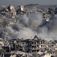 This picture taken from Israel's border with the Gaza Strip shows smoke billowing over destroyed buildings during an Israeli strike on July 17, 2025. (Jack Guez/AFP)