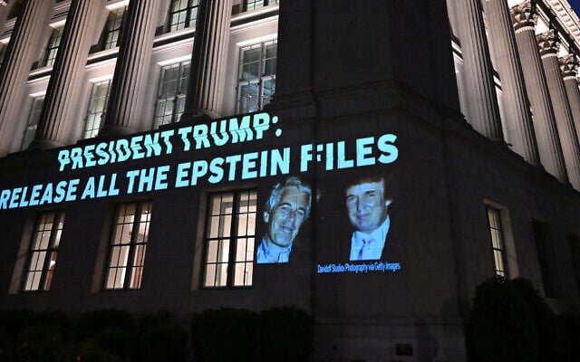 A message calling on US President Donald Trump to release all files related to Jeffrey Epstein is projected onto the US Chamber of Commerce building, across from the White House in Washington, on July 18, 2025. (Alex Wroblewski/AFP)