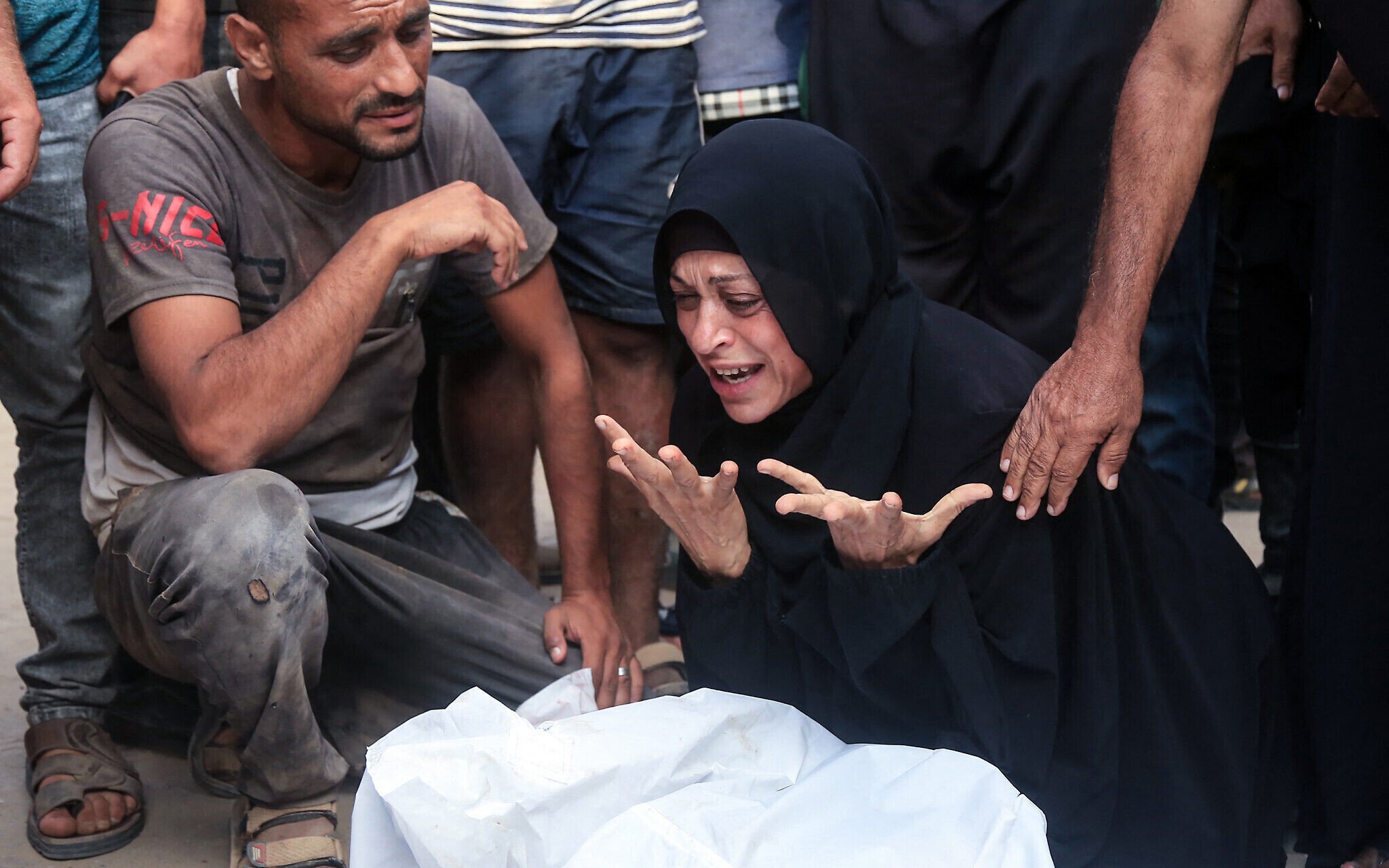 NextImg:Palestinians say at least 26 killed near Gaza aid sites; IDF says troops fired warning shots