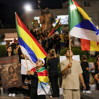 Members of the Druze community in the Israel-annexed Golan Heights gather for a rally in solidarity with the Druze community in Syria in the village of Majdal Shams in the Golan on July 19, 2025. (Jalaa Marey/AFP)
