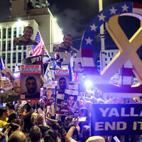 Demonstrators gather during an anti-government protest calling for action to secure the release of Israeli hostages held captive in the Gaza Strip, outside the US embassy branch office in Tel Aviv on July 19, 2025. (Jack GUEZ / AFP)