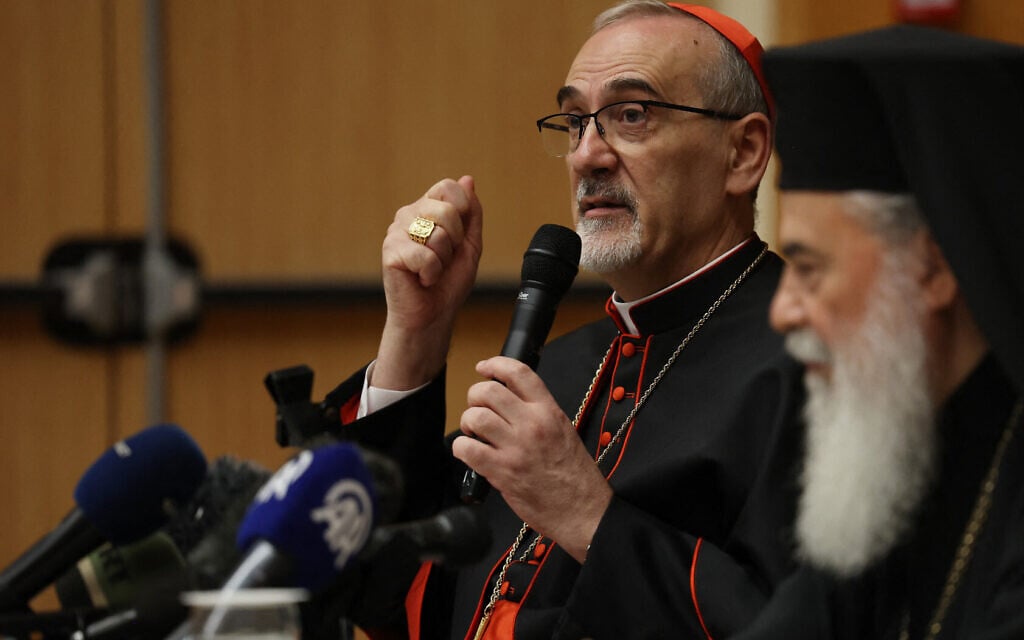 Latin Patriarch of Jerusalem Pierbattista Pizzaballa (L) and Greek Orthodox Patriarch of Jerusalem Theophilos III hold a joint press conference in Jerusalem on July 22, 2025. (Ahmad GHARABLI / AFP)