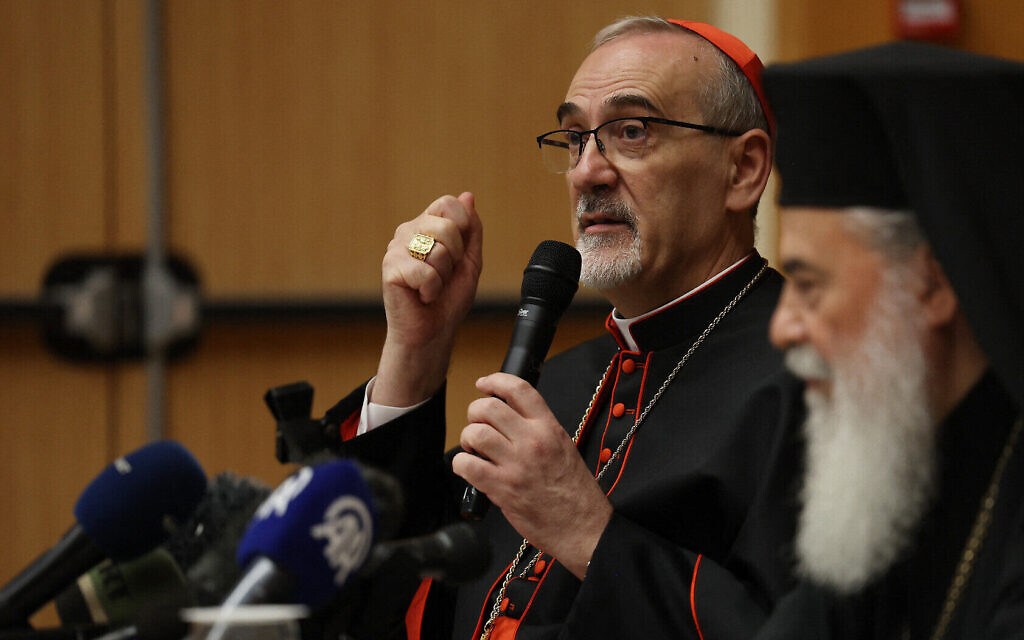 Latin Patriarch of Jerusalem Pierbattista Pizzaballa (L) and Greek Orthodox Patriarch of Jerusalem Theophilos III hold a joint press conference in Jerusalem on July 22, 2025. (Ahmad GHARABLI / AFP)