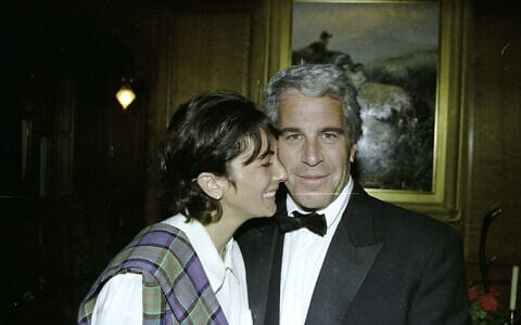 This undated trial evidence image obtained December 8, 2021, from the US District Court for the Southern District of New York shows British socialite Ghislaine Maxwell and US financier Jeffrey Epstein. (US District Court for the Southern District of New York / AFP)