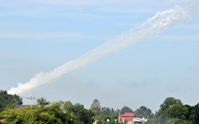 Smoke is pictured in the air as a multi-rocket launcher is fired near the Cambodia-Thailand border in Oddar Meanchey province on July 25, 2025 (TANG CHHIN Sothy / AFP) Smoke is pictured in the air as a multi-rocket launcher is fired near the Cambodia-Thailand border in Oddar Meanchey province on July 25, 2025 (TANG CHHIN Sothy / AFP)