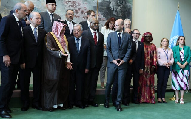 Saudia Arabia's Foreign Minister Faisal bin Farhan Al-Saud (front, 3L) speaks with UN chief Antonio Guterres as French Foreign Minister Jean-Noel Barrot (5R) looks on as they gather at a UN conference on a two-state solution for Israel and the Palestinians, at UN headquarters, July 28, 2025, in New York City. (CHARLY TRIBALLEAU / AFP) Saudia Arabia's Foreign Minister Faisal bin Farhan Al-Saud (front, 3L) speaks with UN chief Antonio Guterres as French Foreign Minister Jean-Noel Barrot (5R) looks on as they gather at a UN conference on a two-state solution for Israel and the Palestinians, at UN headquarters, July 28, 2025, in New York City. (CHARLY TRIBALLEAU / AFP)