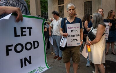 Americans, some belonging to a coalition of Jewish groups, gather to demand that Israel let more aid into Gaza, outside the Israeli consulate in Manhattan on July 28, 2025, in New York City. (Spencer Platt/Getty Images/AFP)
