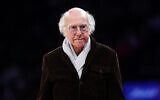 Actor and comedian Larry David leaves Madison Square Garden after an NBA basketball game between the New York Knicks and the Boston Celtics, February 8, 2025, in New York. (AP Photo/Noah K. Murray)