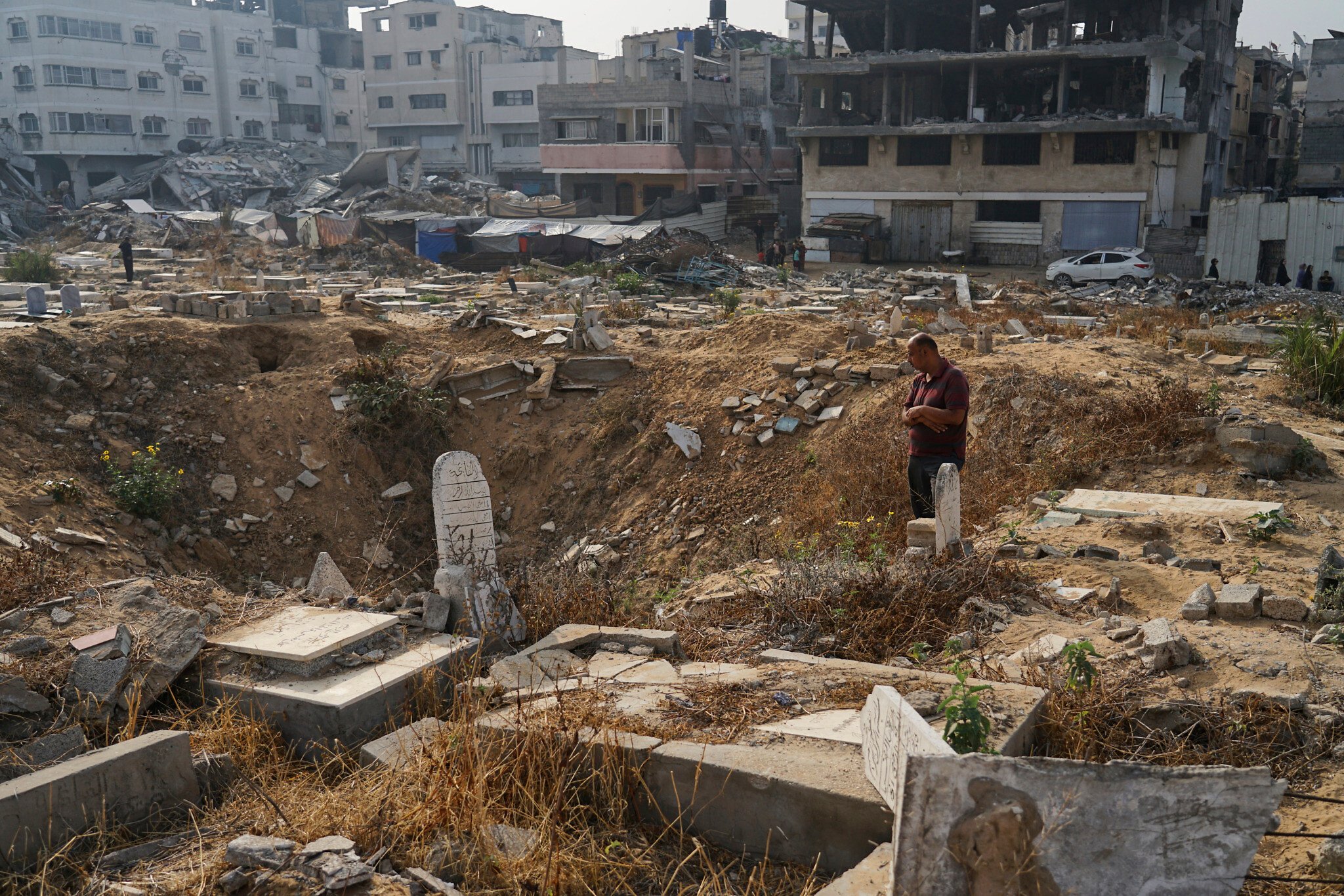 NextImg:Amid shortages of much else, Gazans are now running out of places to bury their dead
