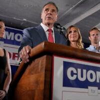 Mayoral candidate Andrew Cuomo, center, speaks to supporters gathered to watch the voting results of the Democratic party primary, Tuesday, June 24, 2025, in New York. (AP/Yuki Iwamura)