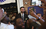Democratic mayoral candidate Zohran Mamdani takes selfies with supporters after speaking at his primary election party, June 25, 2025, in New York. (AP Photo/Heather Khalifa)