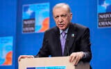 Turkish President Recep Tayyip Erdogan speaks during a media conference at the NATO summit in The Hague, Netherlands, June 25, 2025. (AP Photo/Matthias Schrader)