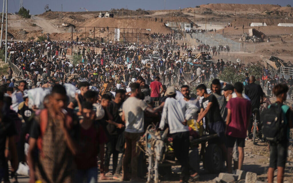 Gaza aid group says 20 killed in crowd crush, blames armed Hamas agitators