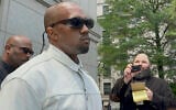 Ye, the US rapper formerly known as Kanye West, leaves federal court during the trial of Sean "Diddy" Combs in New York, June 13, 2025. (AP/Larry Neumeister)